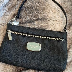 Small black Micheal Kors wristlet purse